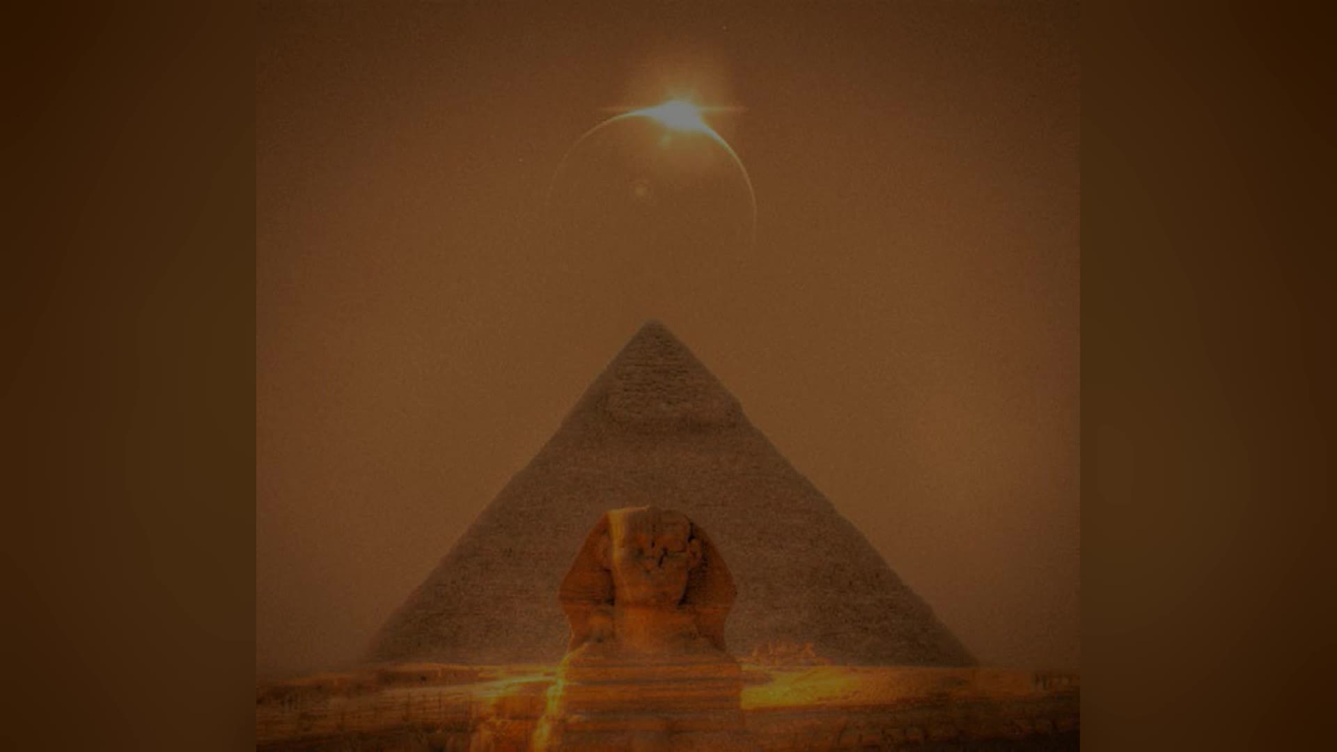 Still from The Revelation of the Sphinx: the Sphinx before a pyramid.